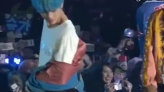 The back after Tai Heng takes off coat to reveal i